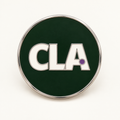 Digital mock-up: front view of the CLA enamel pin in forest green, off-white and purple with nickel detailing.